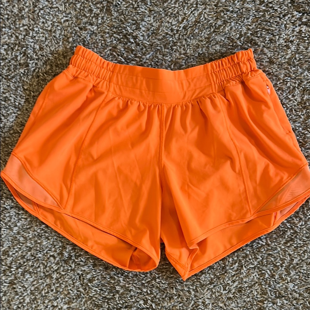 4” Lululemon Hotty hot shorts like new! Orange